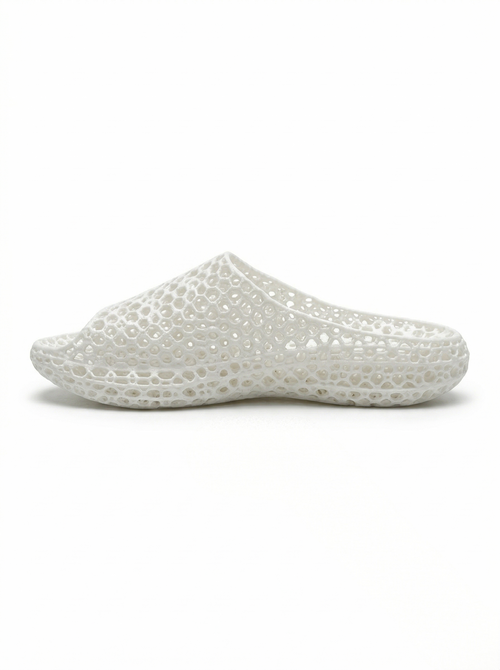 White one-piece SLS 3D-printed TPU slide side view